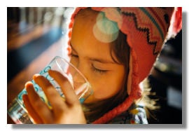 Image of girl drinking a glass of water