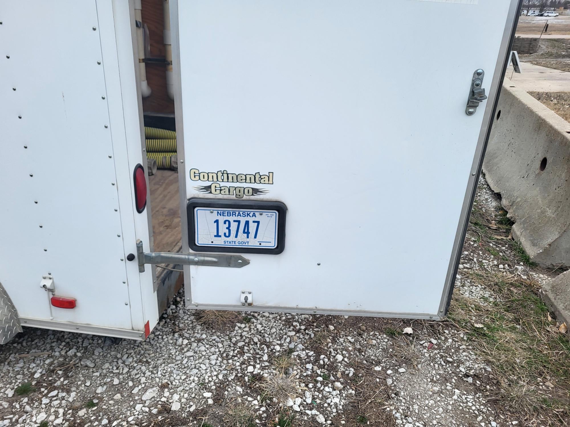 Image of trailer door and license plate 