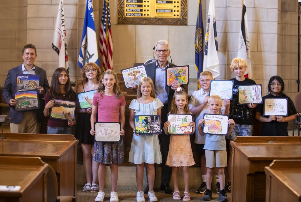 A group photo of the Nebraska: Don't Waste It! Calendar Contest winners with Lt. Gov Joe Kelly and DWEE Director Jesse Bradley.